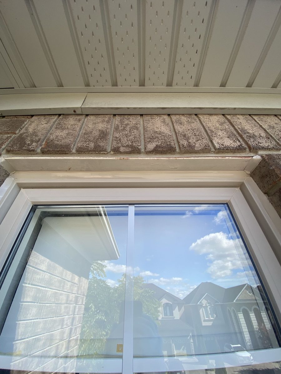 After: Brick window head — old bead out, head joint resealed