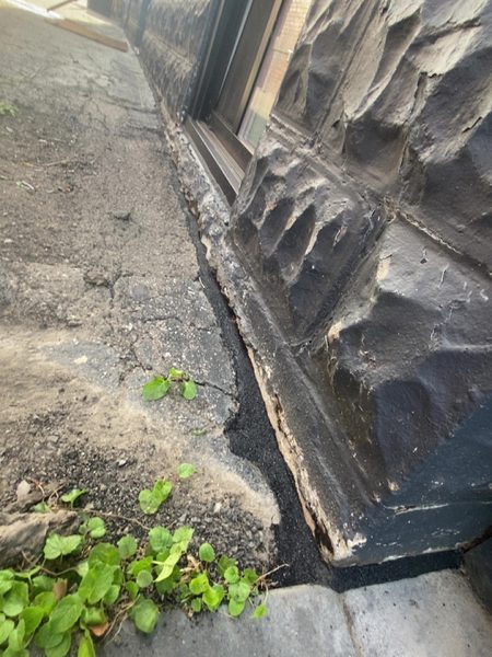 After: Stone veneer to walkway — base joint sealed and sandblasted to a stone-like finish