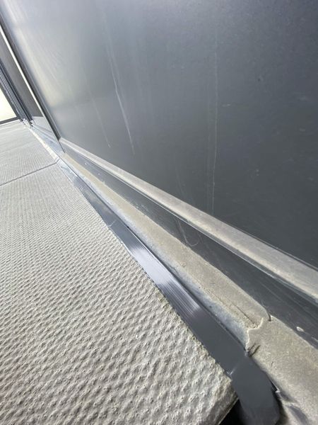 Frame to stone sill — colour-matched bead