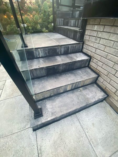 After: Glass railing base and step joint