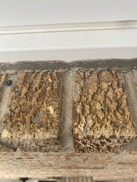 Before: Stone sill and header — joint rebuilt