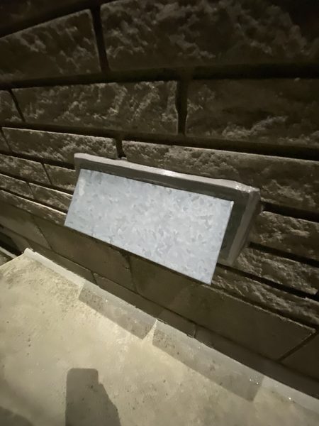 Louvre vent on stone — flange sealed